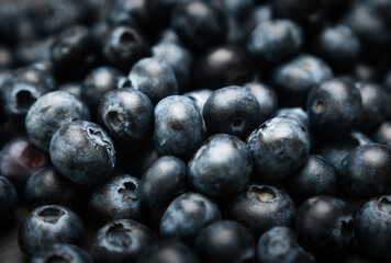 A background image with blueberries in a detailed view and different levels of focus