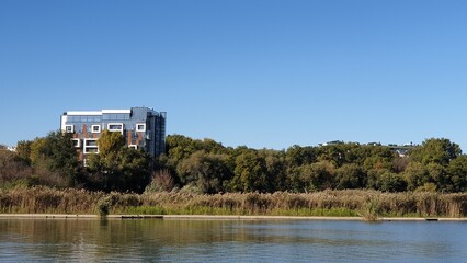 Fototapeta premium Moldova, Chisinau, autumn, road, park, forest, trees, leaves, lake, squirrel, ducks, reeds, stairs, fountain, park architecture
