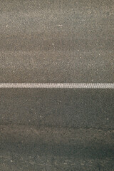 Fototapeta premium Cold plastic structured stripes with dot pattern for road surface marking as background