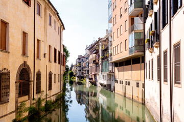 Strange buildings of Padua, the historic center of the city around which there is a canal