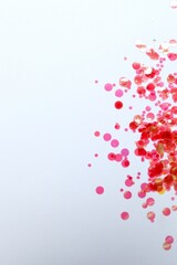 Beautiful sparkling confetti on a white background