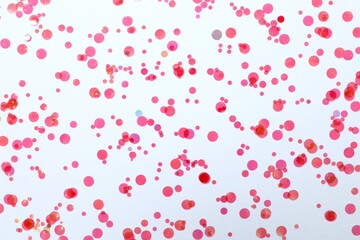 Beautiful sparkling confetti on a white background
