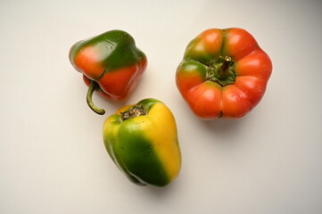 
peppers on a white table