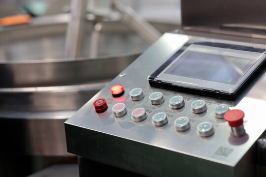 control console of automated dough mixer in bakery