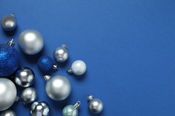 Festive Christmas background with confetti and balls, copy space composition