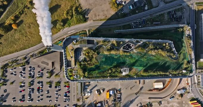 Aerial drone view of CopenHill artificial ski slope on the roof of an energy plant