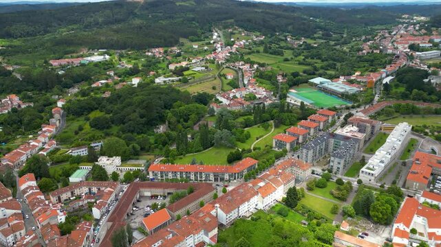 Aerial drone view of country side of Galicia, Spain. View of surroundings of Santiago de Compostela. Granxa do Xesto Park in background. Natural green landscape, typically for this region. Forward