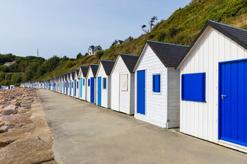 Blue and white beach cabins at Barneville-Carteret, Normandy, France