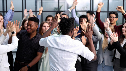 Portrait of business and advertising team, laughing and clapping