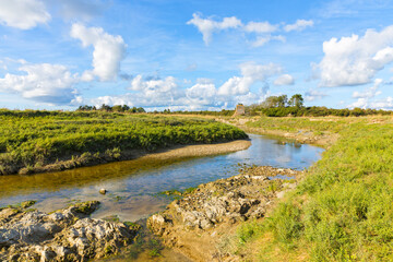 River Ay flowing through salt marsh landscape at Saint-Germain-Sur-Ay
