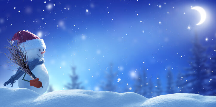 Winter  background .Merry Christmas and happy New Year greeting card with copy-space. Christmas landscape with snow and snowman