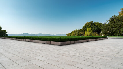 Tranquil Outdoor Space with Lush Greenery and Clear Skies