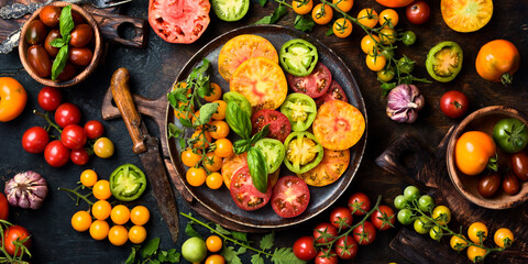Sliced ​​tomatoes. Keto diet, healthy food. Fresh salad bowl. Top view.