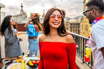 Chic beauty woman smiling while friends partying outdoors