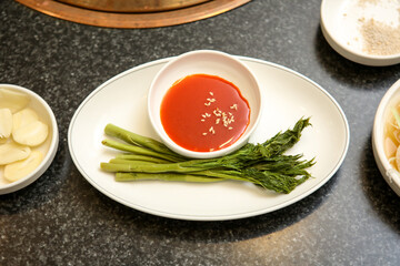 Korea vegetable Bracken Fatsia Shoot Salad with red chili pepper paste with vinegar