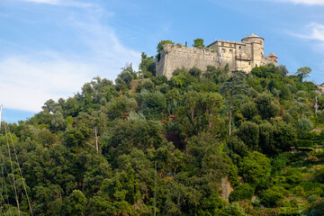 View of Castello Brown, an ancient landmark on a hilltop in Portofino, Italy