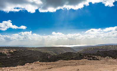 Tranquil Cypriot Landscape: Mountain View with Clear Sky and Sparse Vegetation