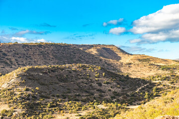 Tranquil Cypriot Landscape: Mountain View with Clear Sky and Sparse Vegetation
