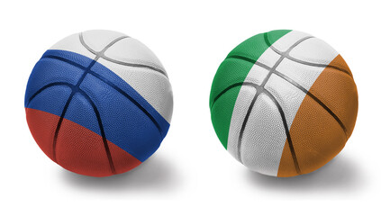 basketball balls with the national flags of ireland and russia on the white background.