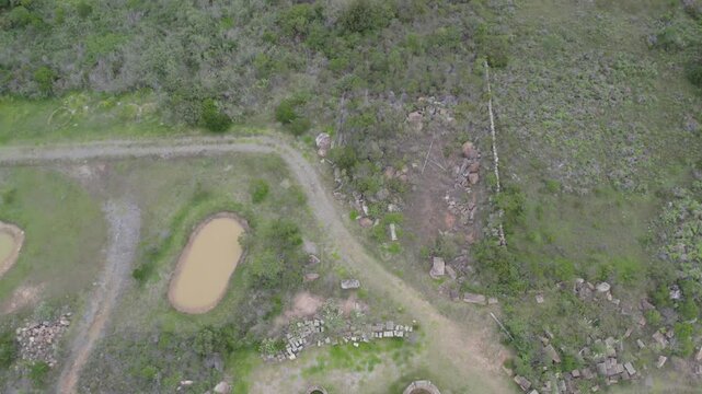 In this immersive drone video, Ecopark Conscientia Universallis unfolds like a hidden sanctuary within lush green landscapes. Gimbal tilt up . Pitch Forward