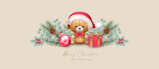 Christmas garland with a cute teddy bear in red cap, gift, fir branches and red berries. Christmas and New Year banner