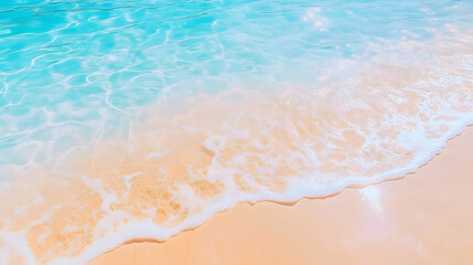 Clear ocean waves softly crashing on a sandy beach with gentle sunlight
