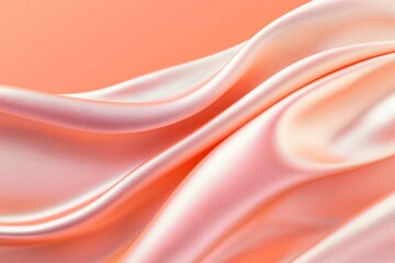 A close-up of smooth, flowing silk fabric in soft peach tones.