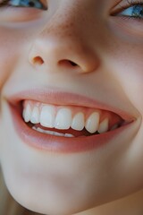 Fototapeta premium Close-up of a smiling girl's teeth.