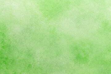 A minimalist soft green texture backdrop, offering soft tones and a clean surface for creative design, top view, copy space