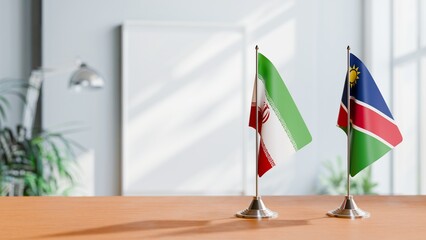 FLAGS OF IRAN AND NAMIBIA ON TABLE