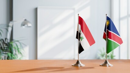 FLAGS OF IRAQ AND NAMIBIA ON TABLE
