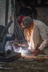 Welder Welding metal causing smoke