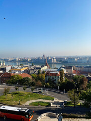 Obraz premium Scenic view of Budapest skyline with river and parliament building