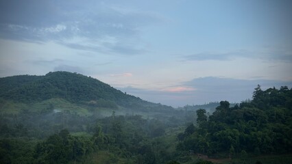 Landscape of mountain with fog in the morning at Bang kama, Ratchaburi, Thailand.