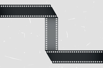 Fototapeta premium Folded movie film strip on grunge background. Vector illustration