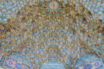 A closeup view of a stunning mosaic ceiling in Nasir ol-Molk Mosque