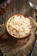 A cup of fermented cabbage or sauerkraut