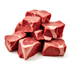 Fototapeta premium Pile of raw meat chunks, likely beef. The meat appears to be fresh and uncooked, with visible marbling