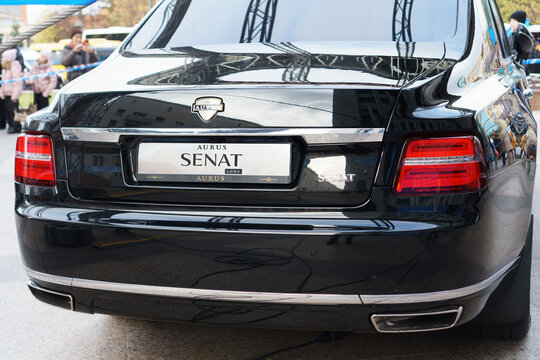 Close-up of the logo and the AURUS Senat Long brand inscription on the car, rear view. Russia, Kazan, October 26, 2024