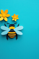 Colorful paper art featuring a bee and vibrant flowers against a bright turquoise background, perfect for nature and crafting themes.