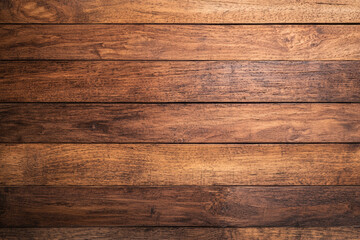 A close-up view of rustic wooden planks showcasing rich textures and warm tones. Perfect for backgrounds or design projects.