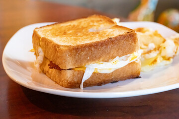Bacon egg and cheese on thick white bread 