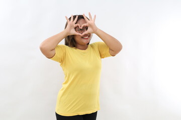 Naklejka premium Portrait of adorable nice person arms fingers demonstrate heart symbol eye isolated on white color background