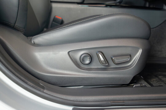 Electric button for adjusting the car electric seat.  Buttons for adjusting seat position.