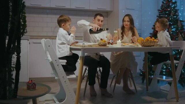  a family having dinner and enjoying 