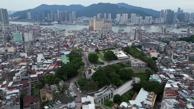 Macau, China: Aerial drone footage of the ancient Monte Fort citadel in the heart of Macau colonial old town in China. Shot with a rotation motion. 