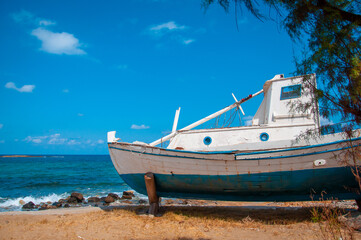 Boat on the background of the blue sea, Crete, Greece