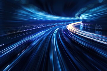 Abstract blue and white light streaks representing speed and motion