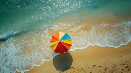 Obraz premium Enjoy a colorful day at the beach under a vibrant umbrella