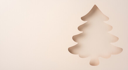 Christmas tree silhouette design on a beige background highlights holiday simplicity and elegance, perfect for festive themes and joyful occasions